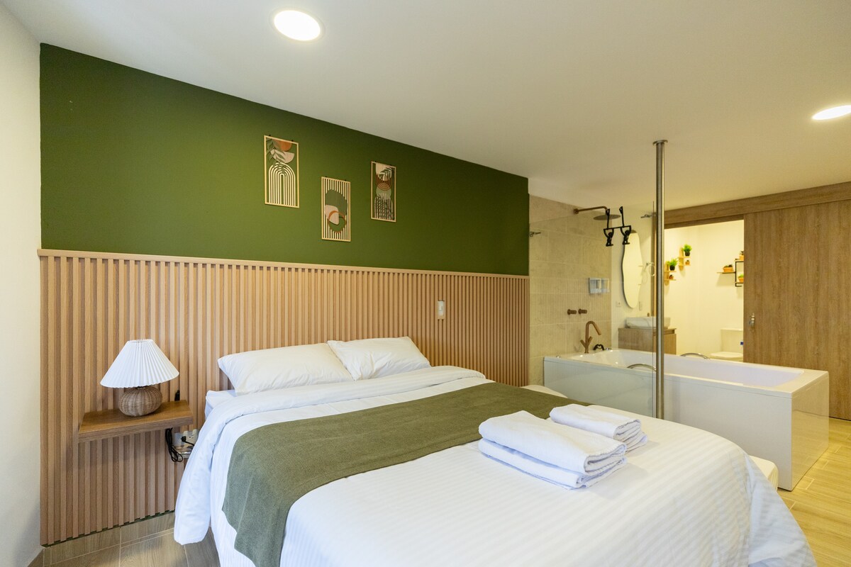 Acogedor loft - vista al malecón y jacuzzi privado
