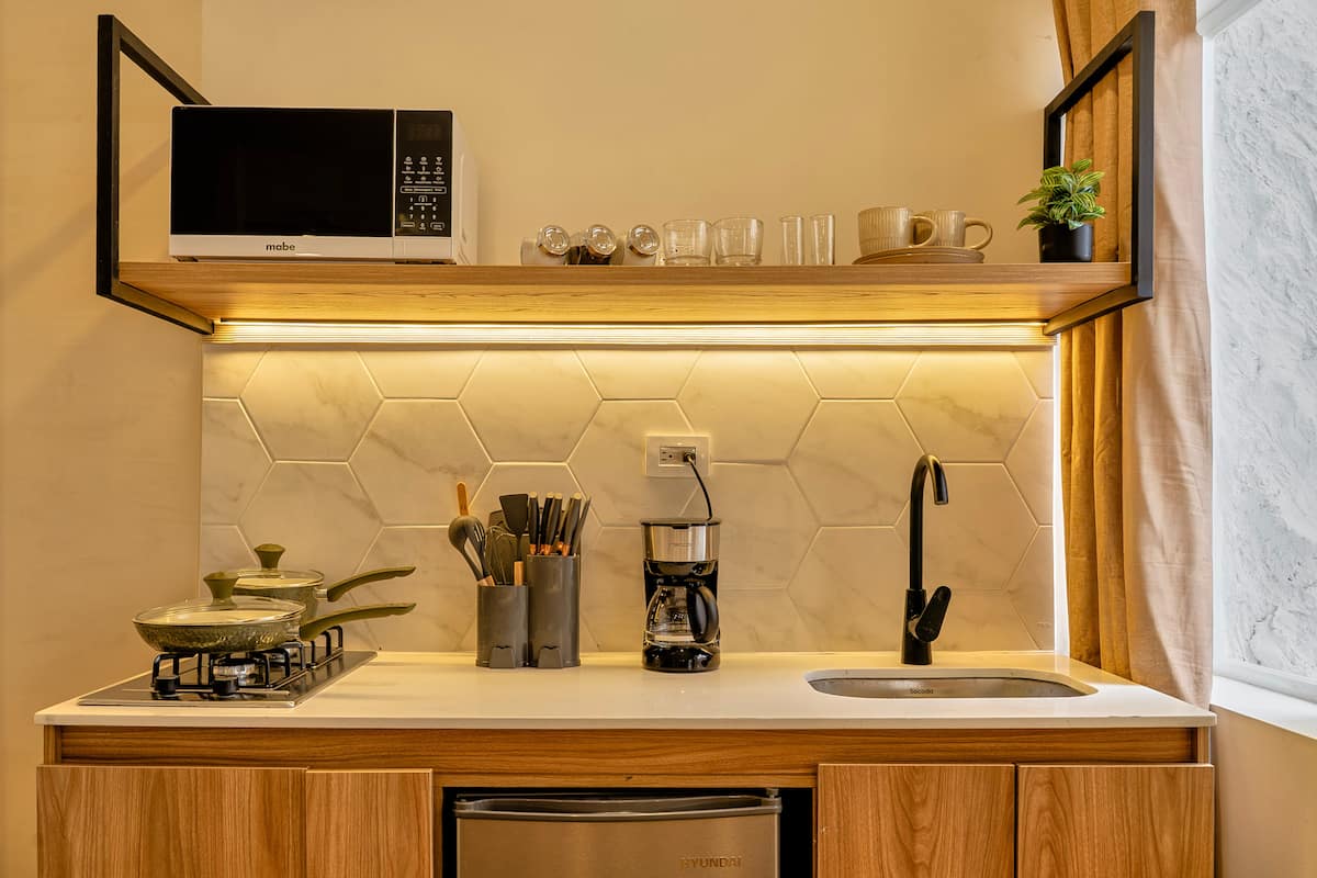 Aura ~ Loft zen con patio y jacuzzi + aire acondicionado