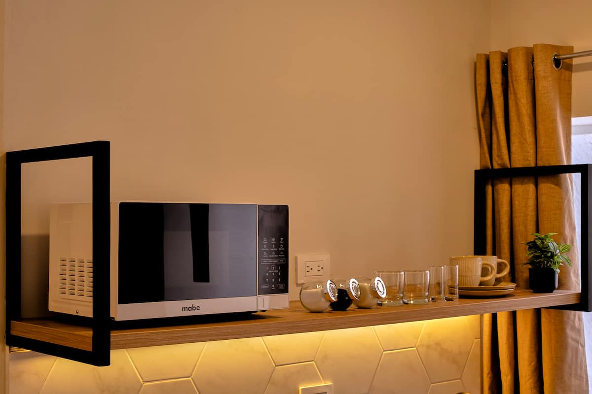 Aura ~ Loft zen con patio y jacuzzi + aire acondicionado